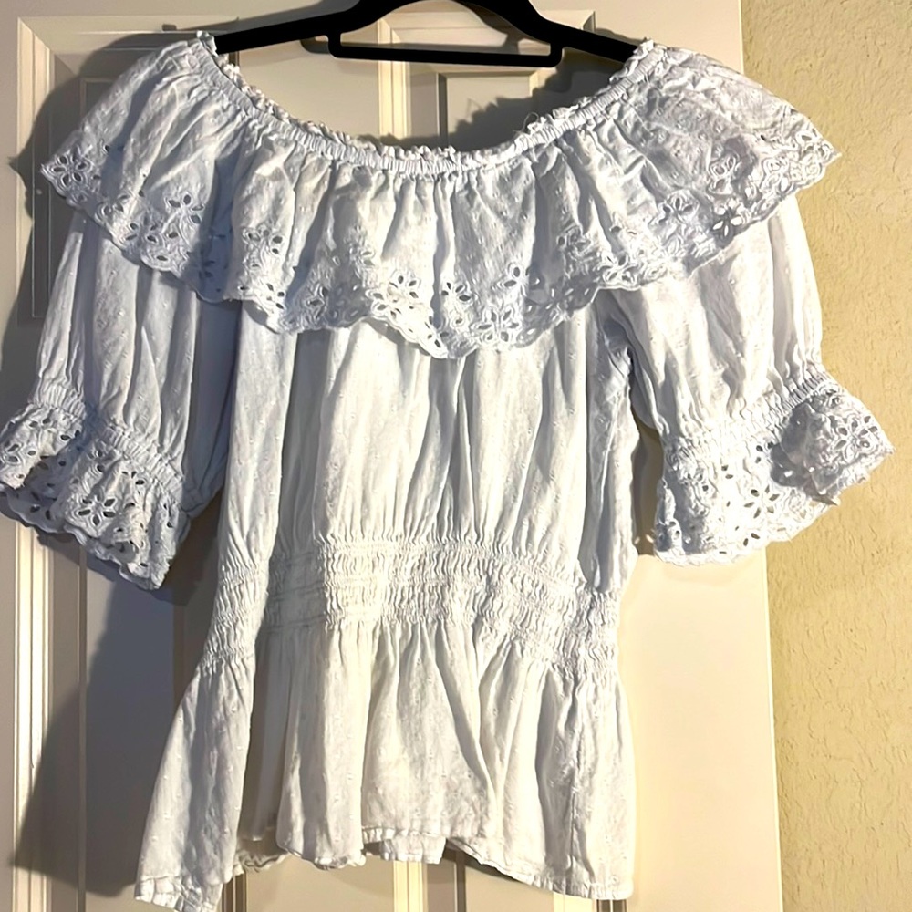 White ruffled blouse. Size M